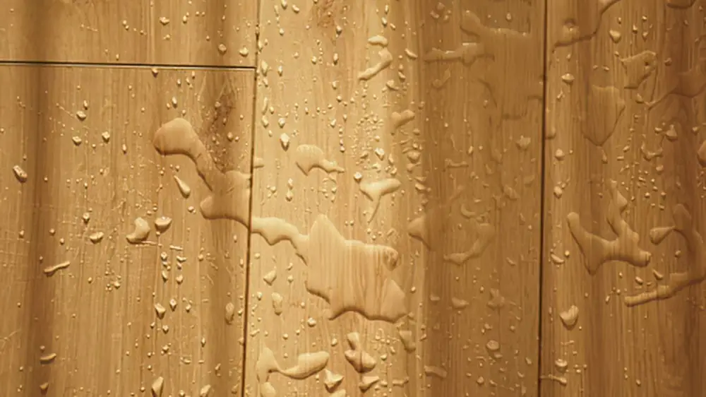 Water beads on wooden boards